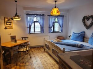 Ubytování v alpské roubence na Šumavě