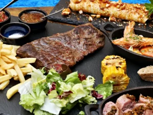 Autentický kulinářský zážitek plný grilu: argentinské asado menu s flank steakem, provoletou a vínem